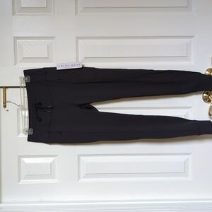 RBX women's NWT black 27" inseam leggings, sz M, with zip side pockets